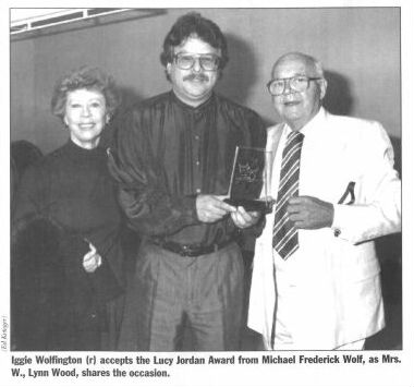 Iggie Wolfington (r) accepts the Lucy Jordan Award from Michael Frederick Wolf, as Mrs. W, Lynn Wood, shares the occasion.