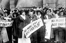 An old black and white photo displaying people protesting.