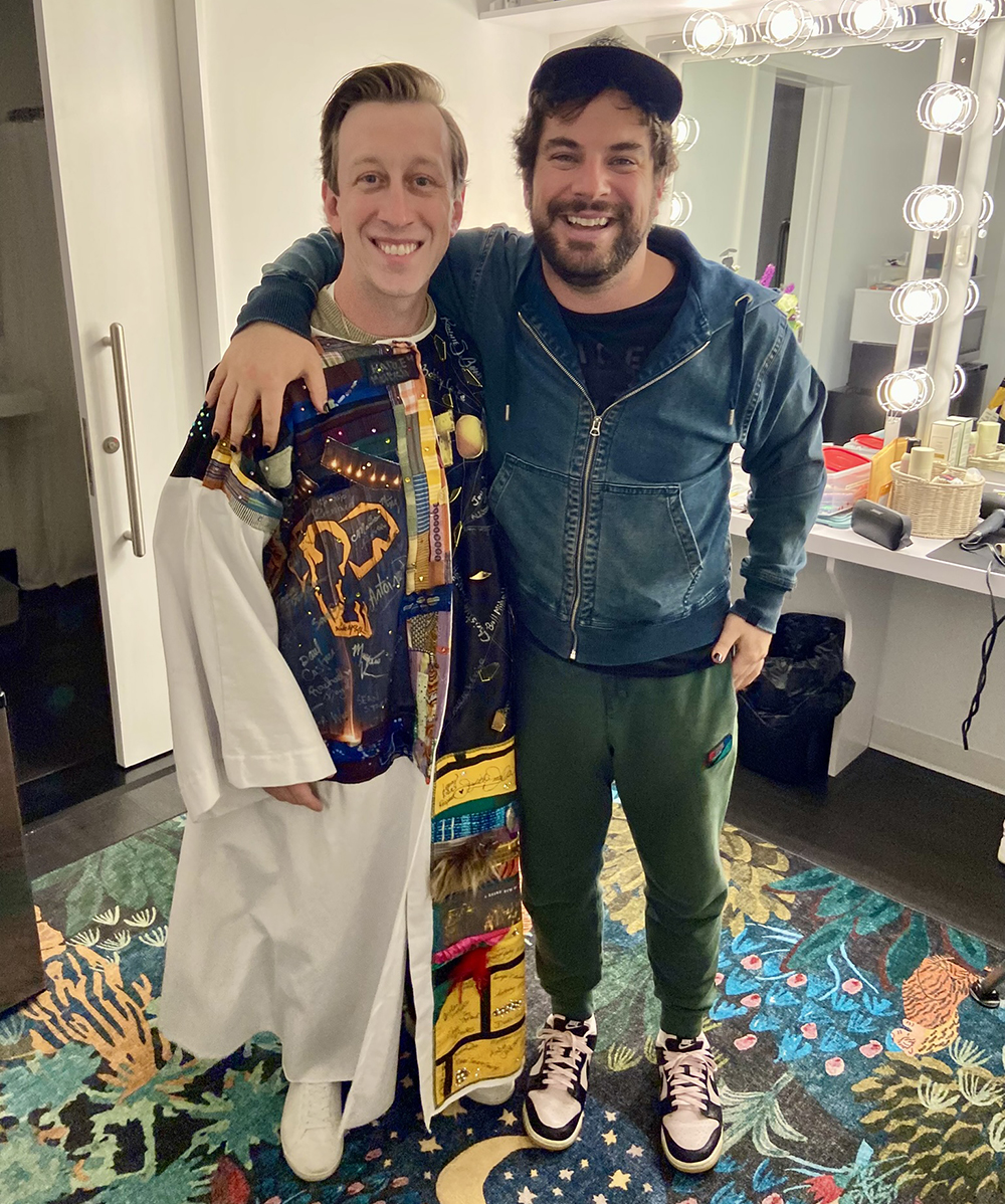 Breslin poses in the Robe in a dressing room with Justin Collette.